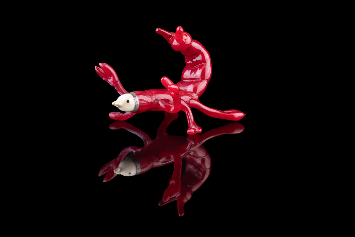 Red sculpture of a scorpion