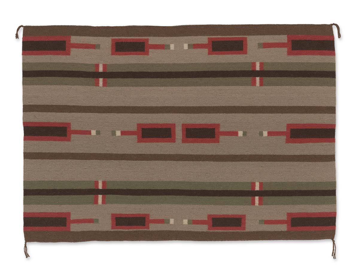 Wool woven tapestry with large geometric patterns of brown, black, and olive green stripes interrupted by large red and black rectangles.