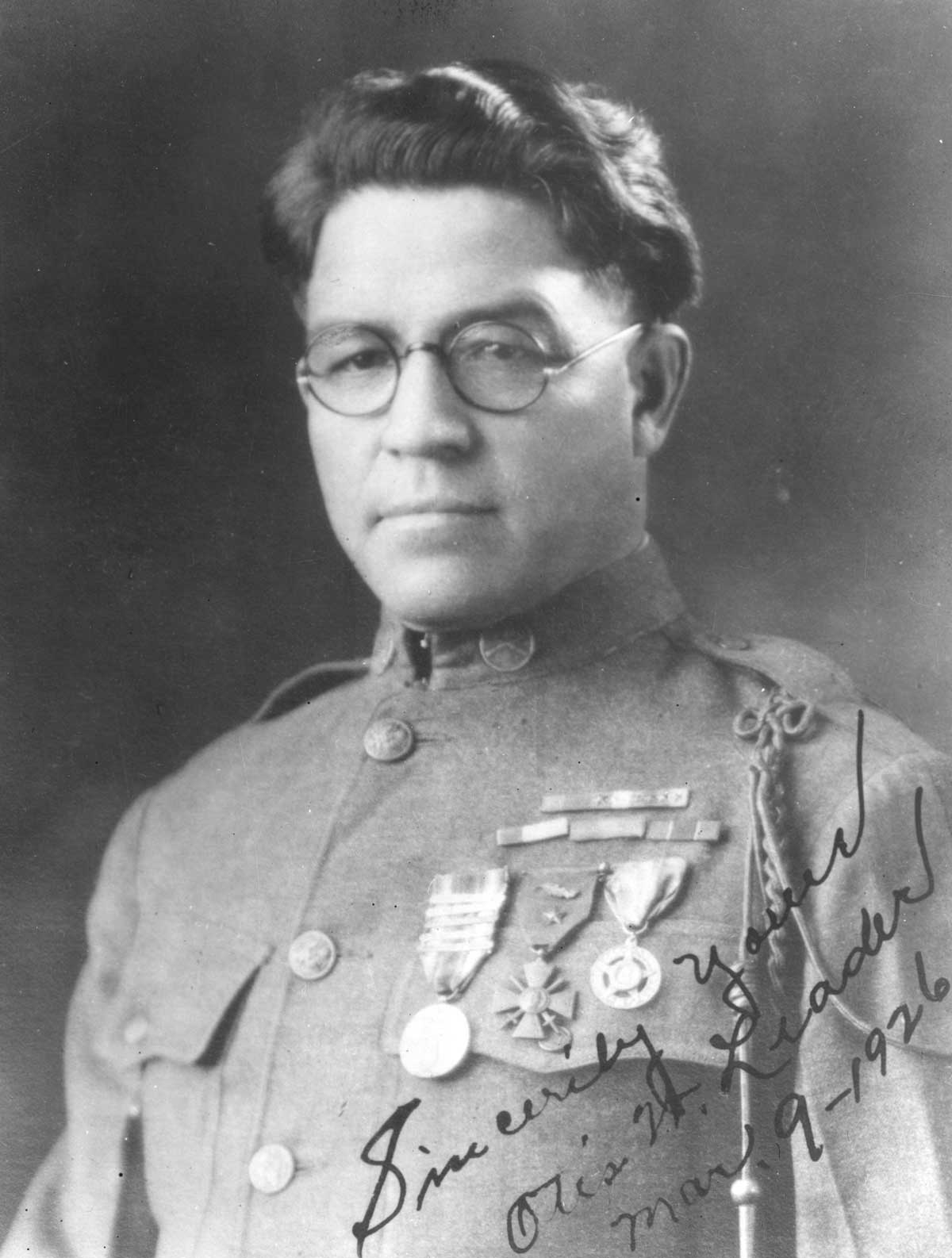 Black and white studio portrait of Corporal Otis Leader