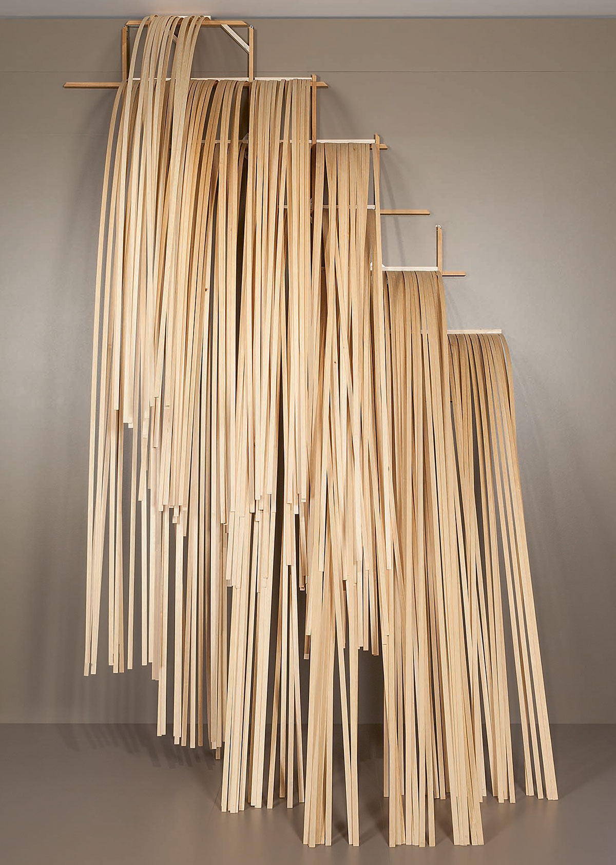 Wooden sculpture depicting cascading water