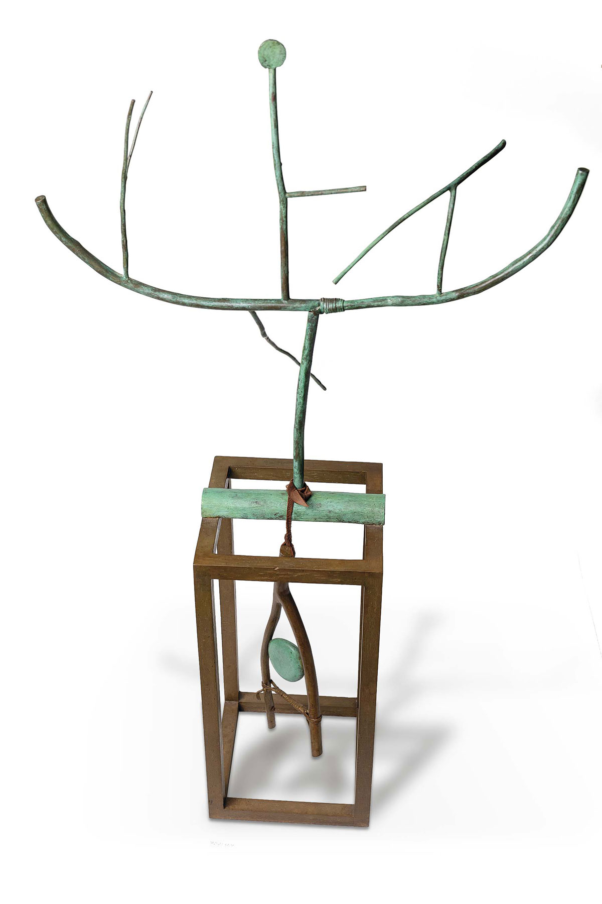 Willow twigs emerge from a cubic bronze frame.