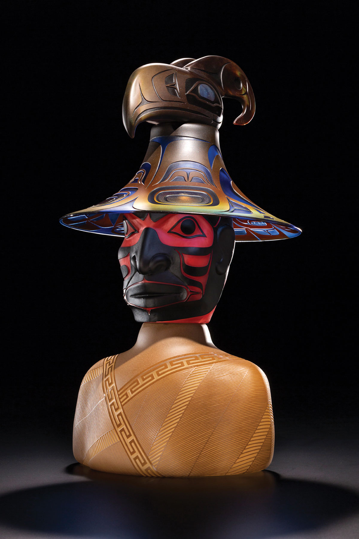 A bust of Thunderbird Man, wearing a hat decorated with a thunderbird