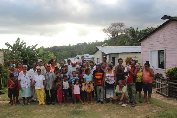 Community gathering for a tobacco ceremony honoring a baptism