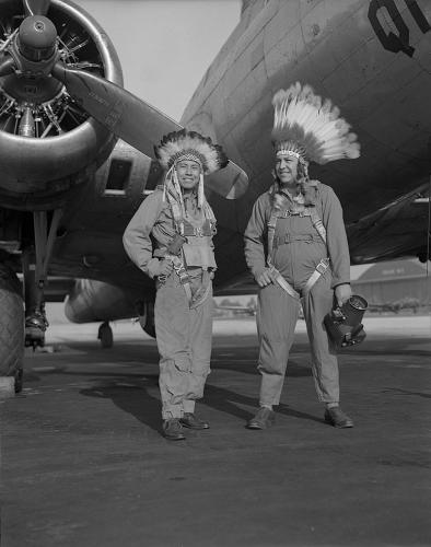 Gus Palmer (Kiowa, at left), side gunner, and Horace Poolaw (Kiowa), aerial phot