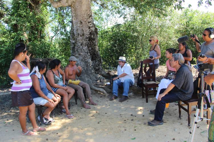 Alejandro Hartmann, Cuban historian, and José Barreiro interviewing a Native family in El Jamal hamlet, near Baracoa, Cuba.