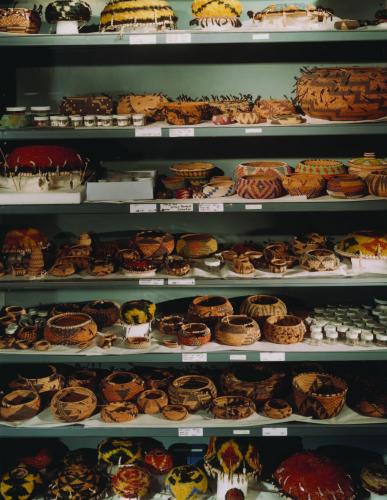 Pomo baskets stored on open shelving in the Research Branch of the NMAI