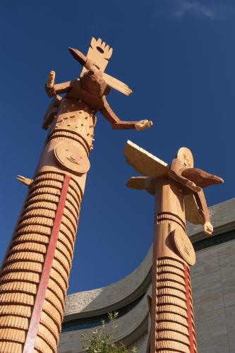 sculptural poles by Rick Bartow