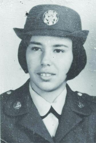 Black and white portrait of Donna Loring in uniform