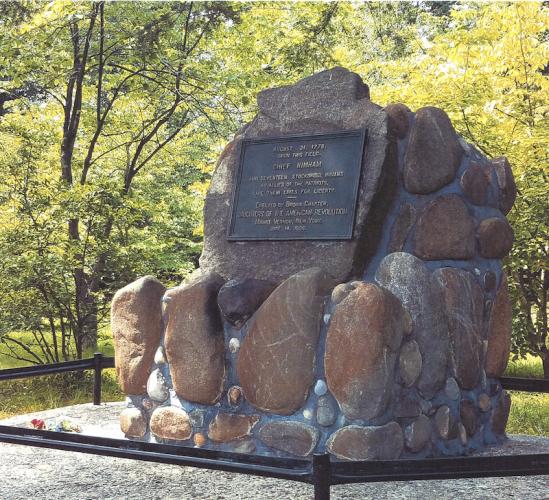 This monument, a boulder of fieldstone conglomerate