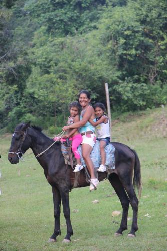 A young mother and daughters mount up for the way home