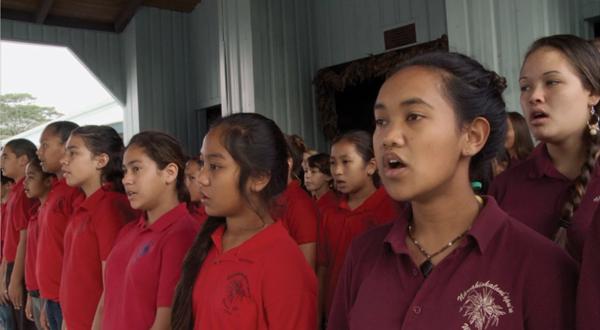 girls singing in classroom