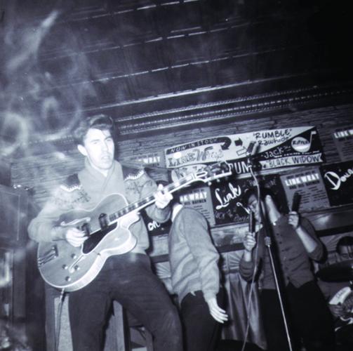 May 1963. Link Wray playing Gibson Byrdland guitar. For more information on the 