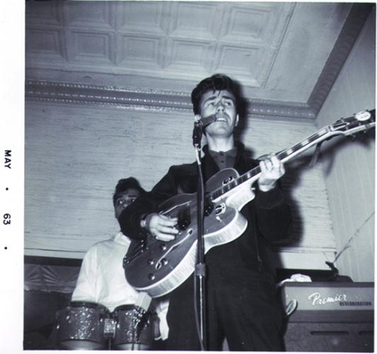 May 1963. Link Wray playing the Gibson Byrdland guitar. Max Navarro is in backgr