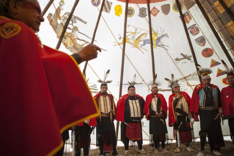Members of the Ton-Kon-Gah, or Kiowa Black Leggings Society standing together