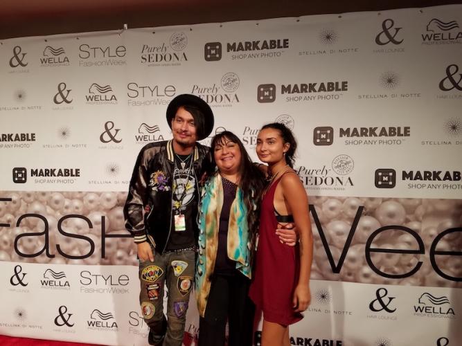 Patricia Michaels (Taos Pueblo) with her son and daughter