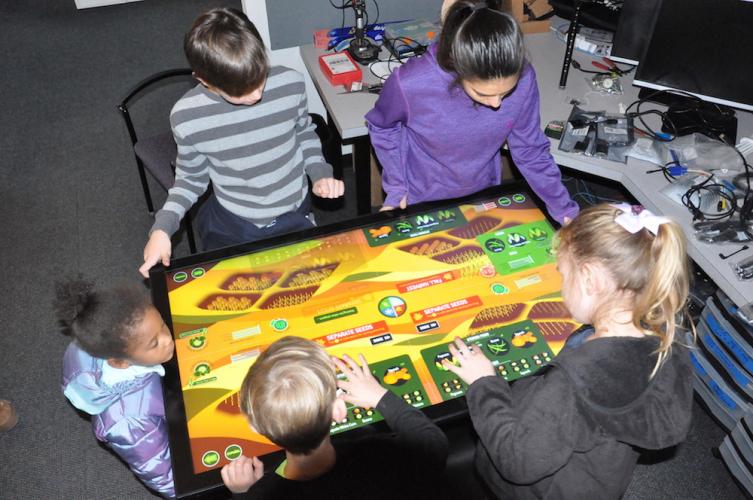 Students test the multimedia game