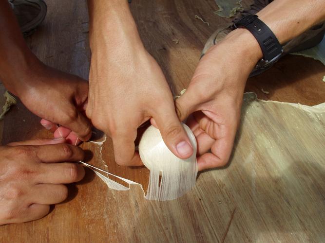 Making an ulama rubber ball.