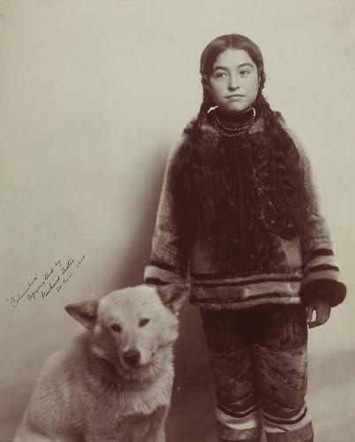 Portrait of Nancy Columbia Enutseak and dog 