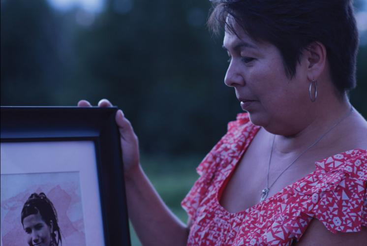 Laurie Odjick contemplates a photo of her daughter, Maisy