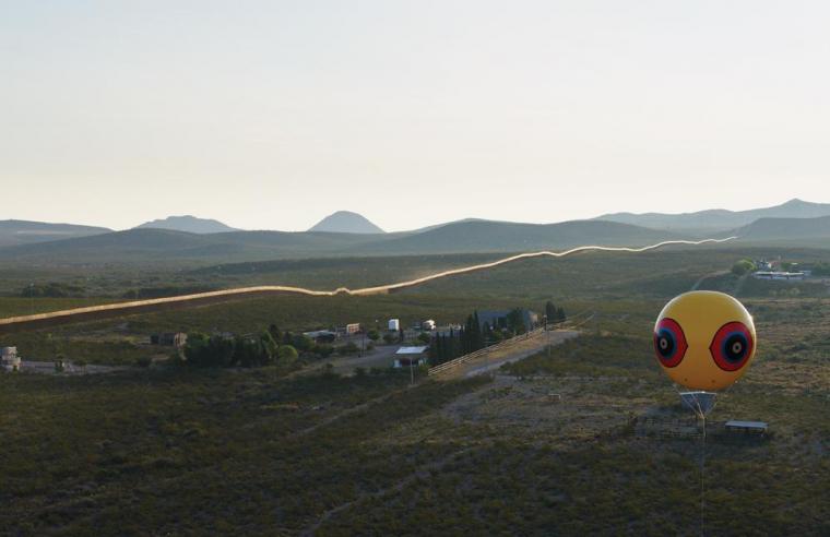 A view of Postcommodity’s Repellent Fence against the U.S.–Mexico border