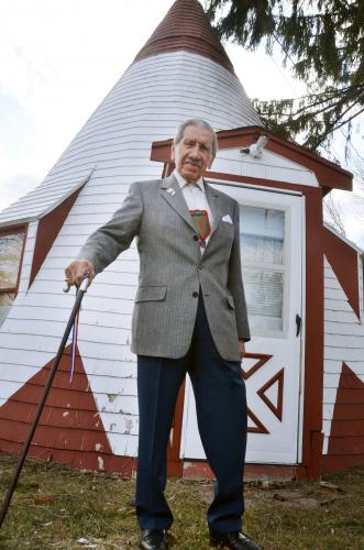 Shay standing outside of museum