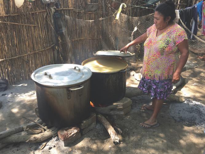 woman brewing chicha