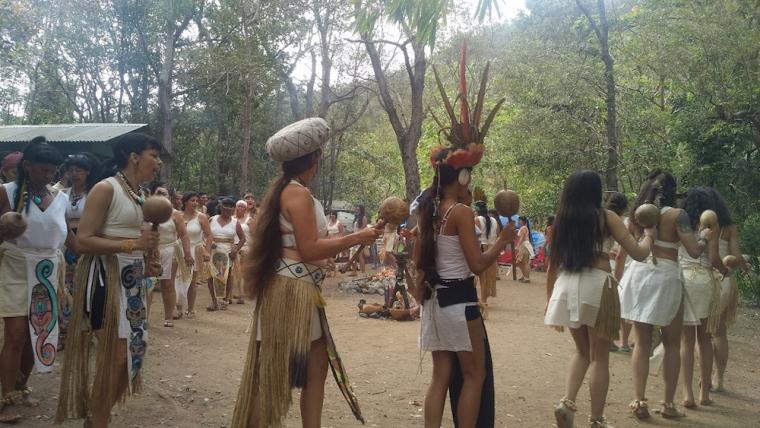 Women and girls of Concilio Taíno Guatu-ma-cu a Borikén do an areíto