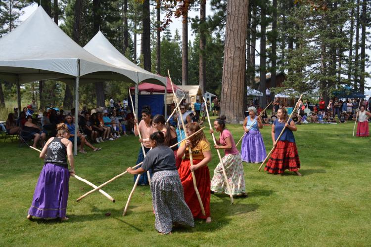 Women playing the game “sigayuk”