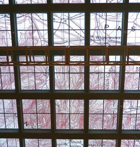 Detail of the skylight above the installation showing a translucent map of Tahquitz’s home in the San Jacinto Mountain range