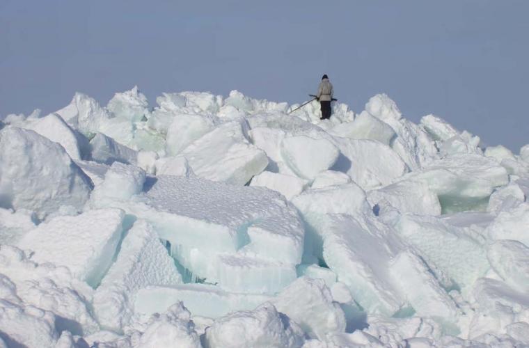 Yupik hunter watching for marine mammals