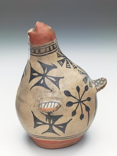 Polychrome bird pitcher with black decorations on cream ware