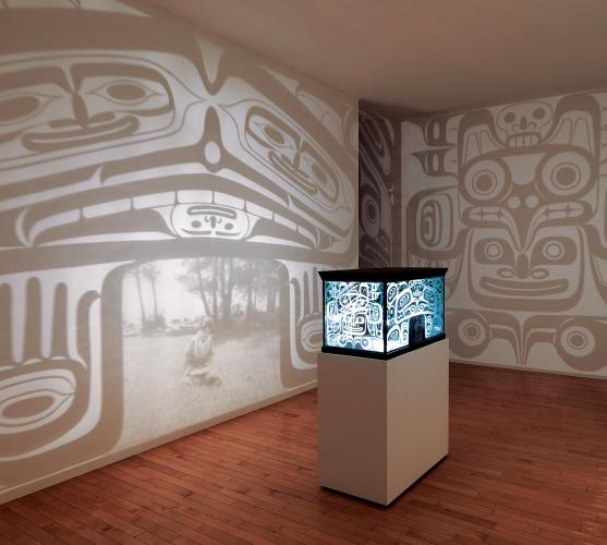 Marianne Nicolson (Kwakwaka’wakw/Dzawada’enuxw First Nations), “Bax’wana’tsi: The Container for Souls,” 2006; glass, cedar, light fixtures, 21.5" x 20" x 40.5"