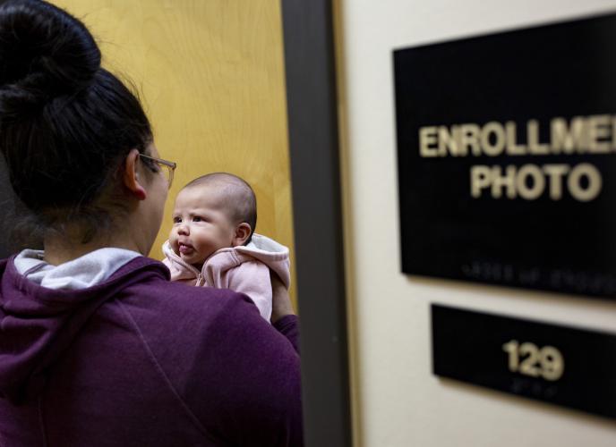 Tiana Antoine and daughter Prairie at the Confederated Salish and Kootenai Tribal Enrollment Office