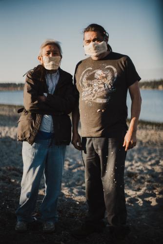 Tsawout First Nation carver Howard La Fortune (right) stands beside his wife