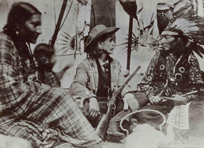 William “Buffalo Bill” Cody talking with one of the Lakota performers