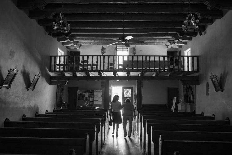 Rafaelita Martinez and Daughter Elizaida Departing the Santo Tomás Parish