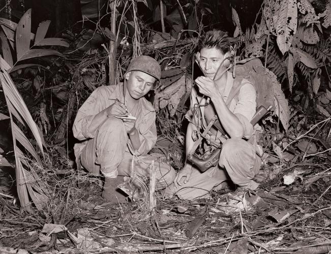 Navajo code talkers Corporal Henry Bahe Jr. (left) and Private First Class George H. Kirk