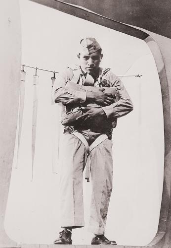 Ira Hayes posing in plane door
