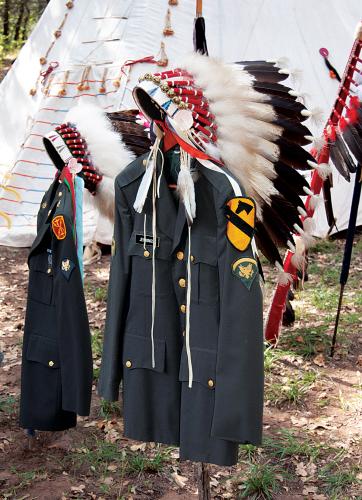 Ton-Kon-Gah, or the Kiowa Black Leggings Warrior Society, mounted eagle-feather war bonnets