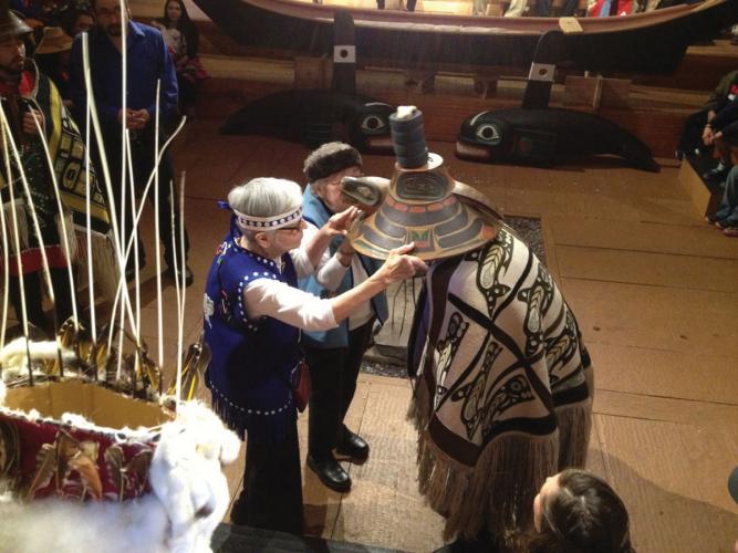 Marmot Hat crest helmet being placed on the head of Harry Bradley