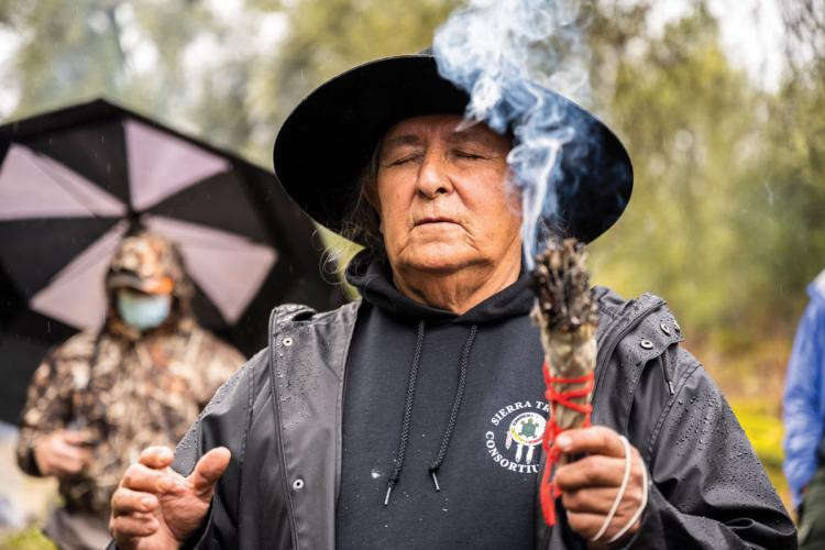 Keith Turner offers a sage smoke blessing