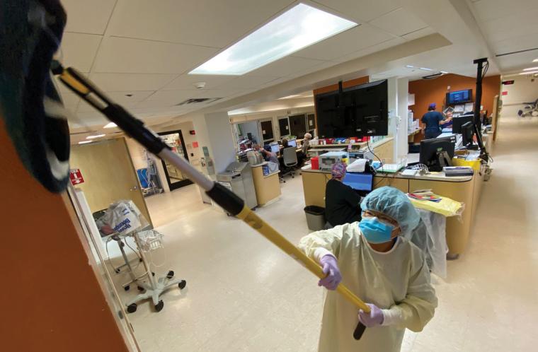 Rehoboth McKinley Christian Health Care Services housekeeper Edith Sherman sanitizes the hospital's emergency room