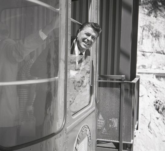 Ronald Reagan poking his head out of the Palm Springs Aerial Tramway