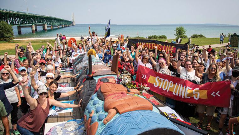 Supporters of the Stop Line 5 event gathered around the totem pole