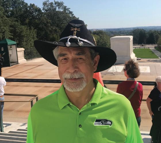 Veteran Mel Sheldon stands in front of the Tomb of the Unknown Soldier in Washington, D.C.