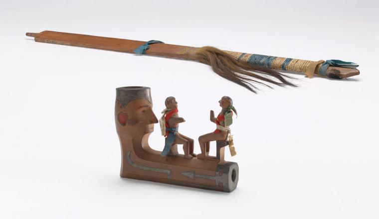Pipe bowl with human figures and stem