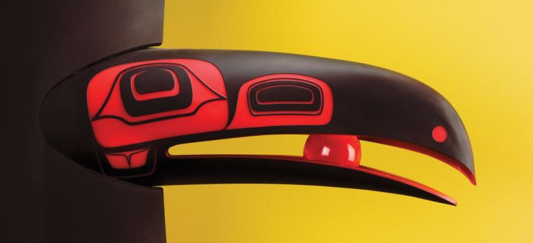 A blackened Raven holding the sun