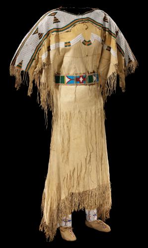 Shoshone hide dress featuring fully beaded shoulders and fringed sleeves and skirt