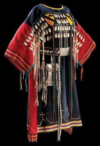 Red, blue and gold Battle Dress with imitation elk teeth worn by female relatives of Ton-Kon-Ga (Kiowa Black Leggings Society) warriors. 