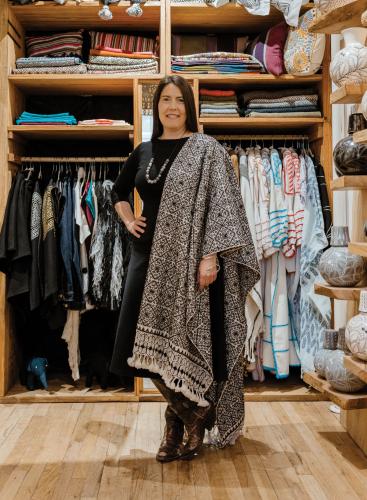 Heidi McKinnon stands in her Santa Fe shop.